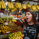 Soprano Marlene Palomares emerges from the banana stall.